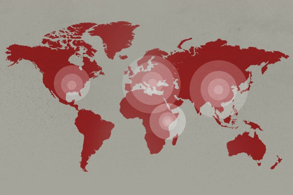 Epicenters of coronavirus pandemic on the world map background